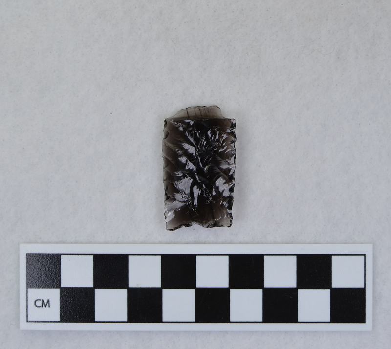 Distal end ground to rest on anvil. Ce.3575A - proximal fragment, Ce.3575B - distal fragment.Bending fracture resulting from attempt to detach channel flake. (JW)
