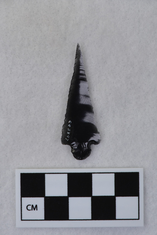 Donald E. Crabtree created this object by unifacially working a blade. This resulted in a stemmed, triangular point.