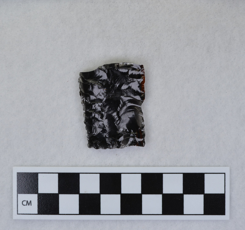 Fragment from Clovis experiment End shock fractured point in half, other portion lost. (GT)