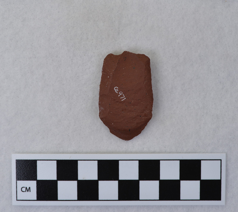Fluting experiment on Folsom done by Donald E. Crabtree, during his fluting experiments. One channel flake removed that removed a portion of distal end of point. The method of channel flake removal was not noted, but appears to be direct percussion with tip supported by anvil. (GT) More information can be found in CE_B32_F9, F10, CE_B33_F6 and CE_B33_F8-Item1