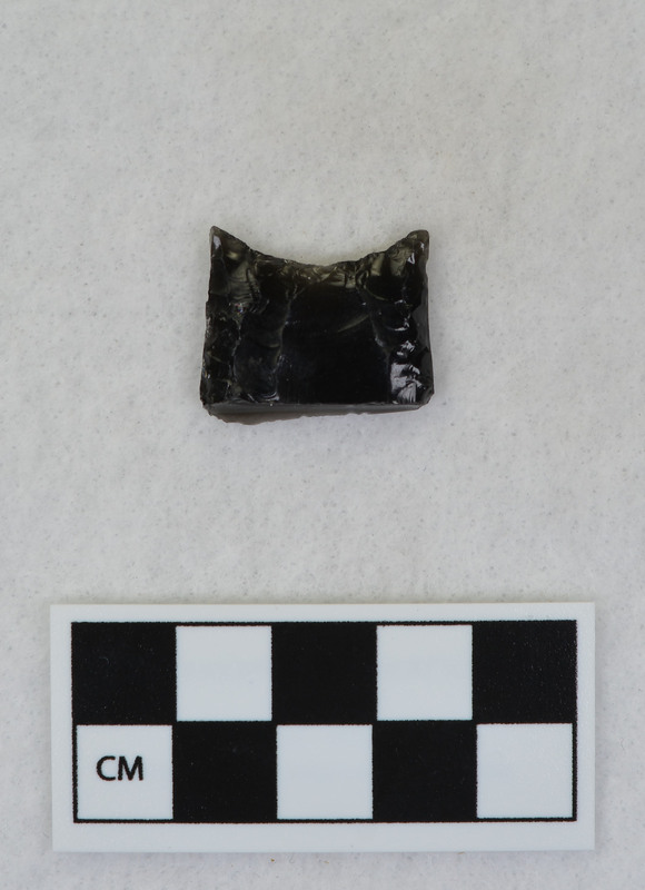 Folsom point base, ground margins