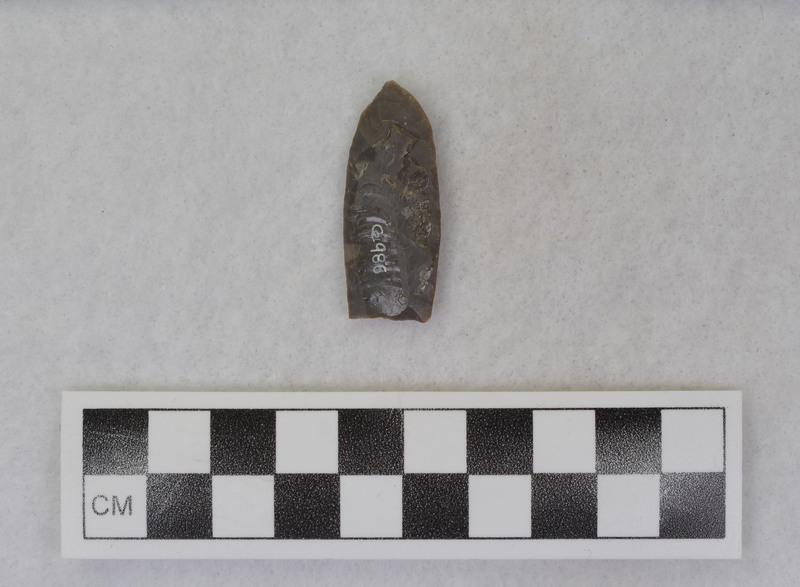 Fluted, similar to Folsom , mends w/Ce.987 Appears to be vise and crutch technique of fluting, margins ground. (GT)