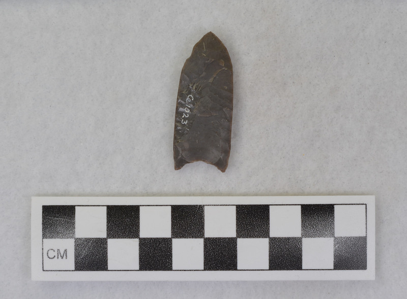 Fluted, similar to Folsom , mends w/Ce.987 Appears to be vise and crutch technique of fluting, margins ground. (GT)