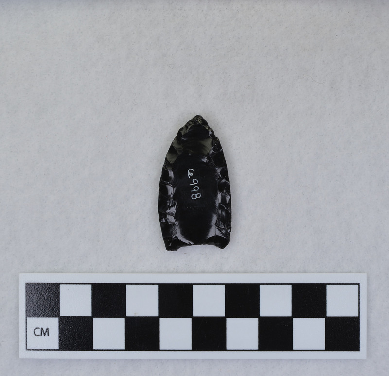 Folsom For some unknown reason the full length of the margins have been ground. (JW)