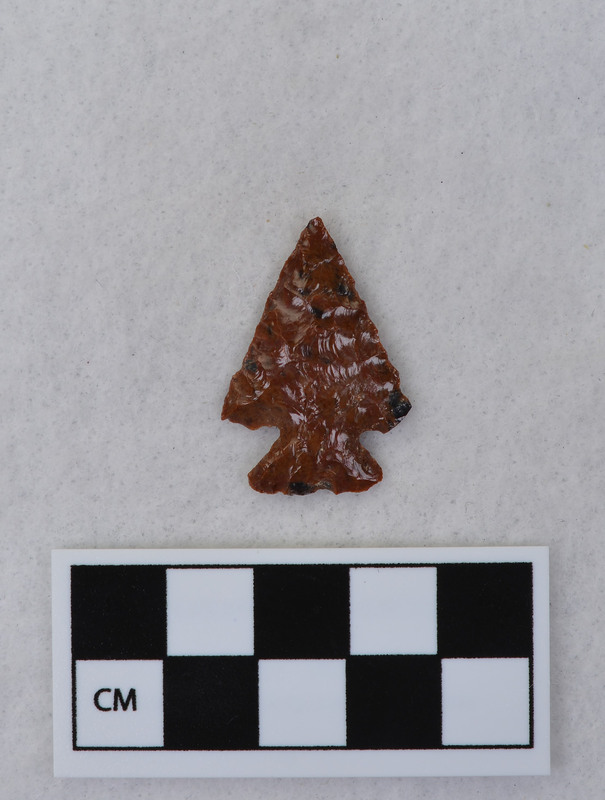 Corner notched, both ears broken during notching