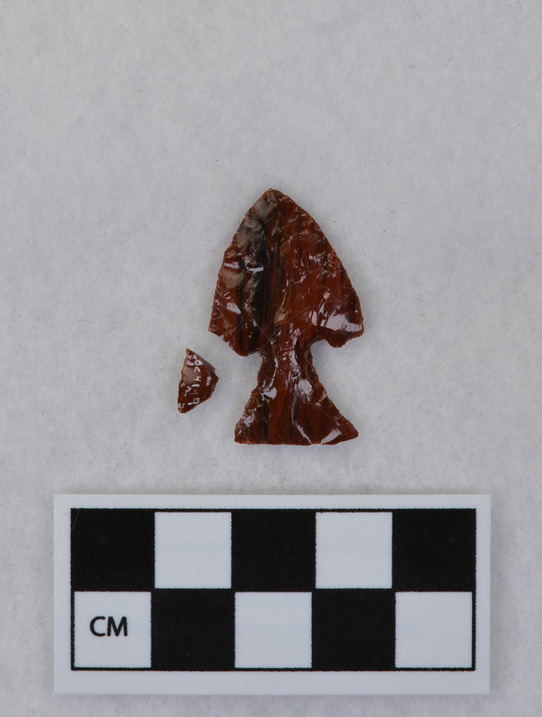 Corner notched, one ear broken