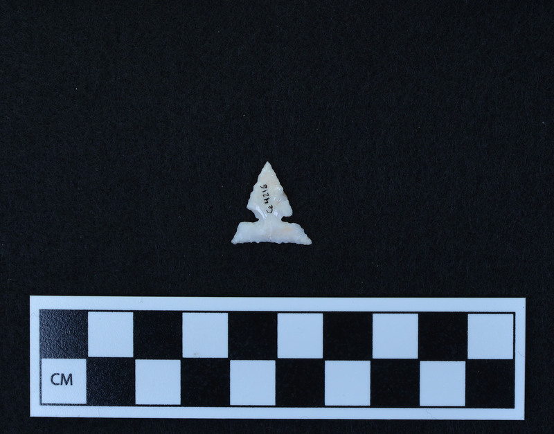 Small, side notched, one shoulder broken in process