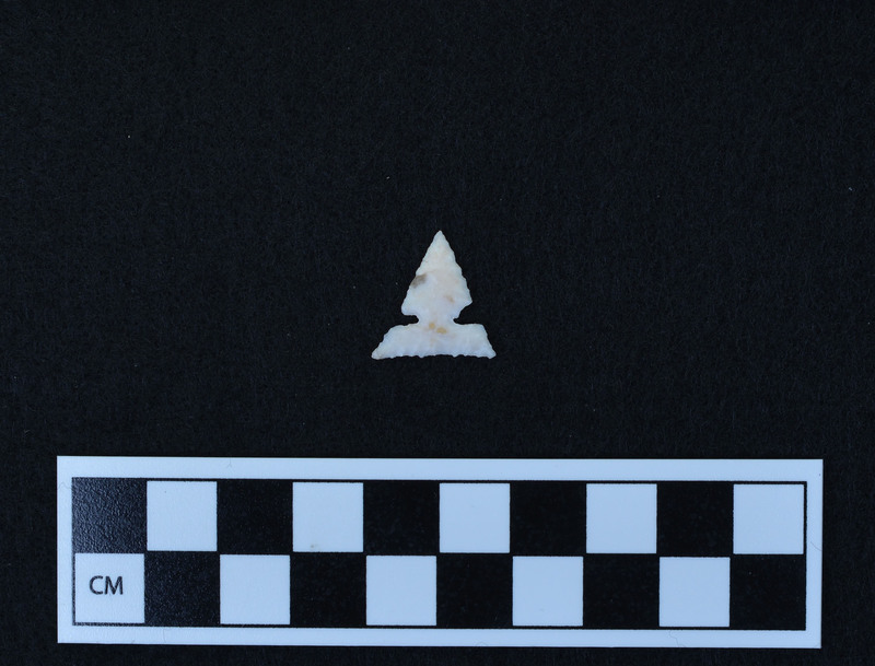 Small, side notched, one shoulder broken in process