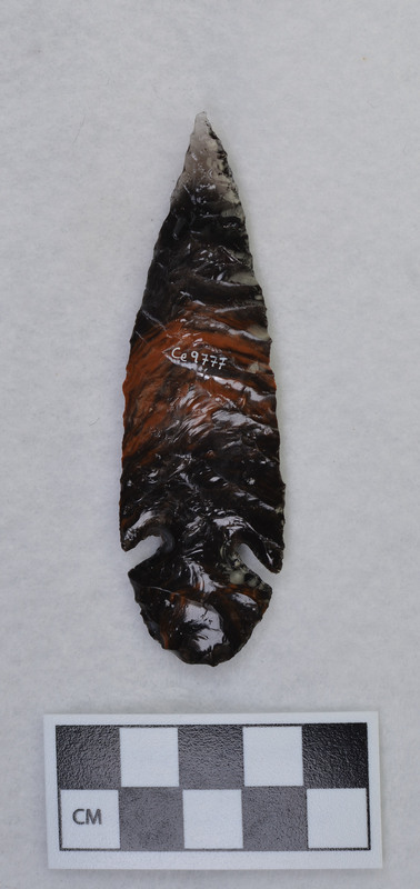 According to Jim Woods, Donald E. Crabtree used multiple techniques to flintknap this object. One side was notched using a small punch. The other side, he used Titmus technique, and the standard palm held technique.