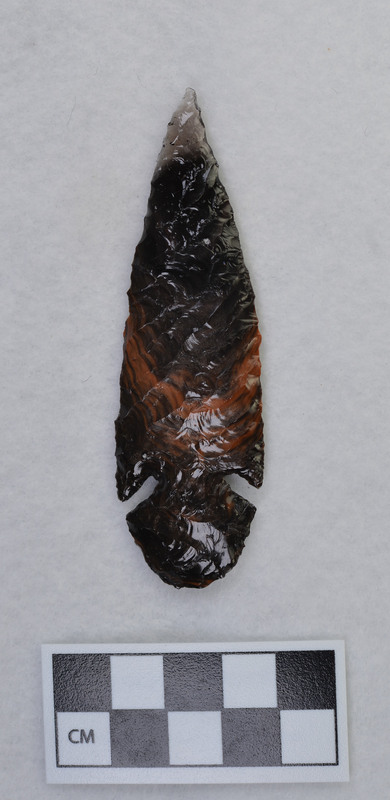 According to Jim Woods, Donald E. Crabtree used multiple techniques to flintknap this object. One side was notched using a small punch. The other side, he used Titmus technique, and the standard palm held technique.