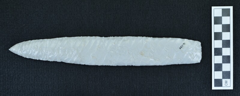 Large, grey/white, glass biface with parallel diagonal flaking on both sides