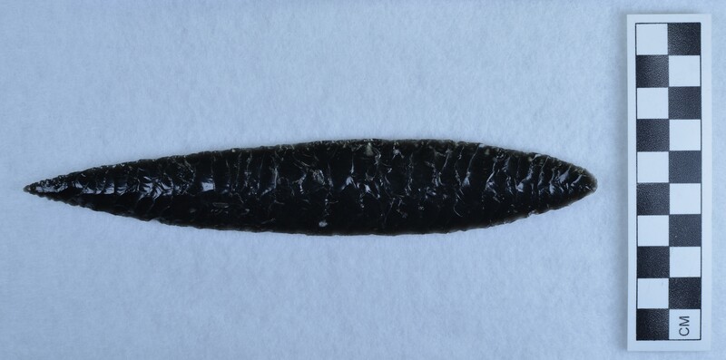 Large, solid black obsidian, biface with collateral flaking on both sides