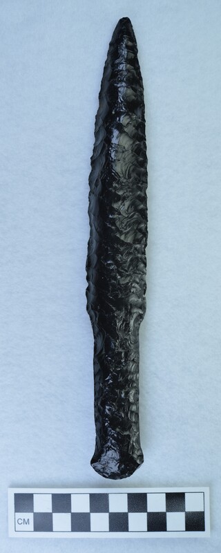 Large, black obsidian dagger made in a style made in Denmark. ground handle