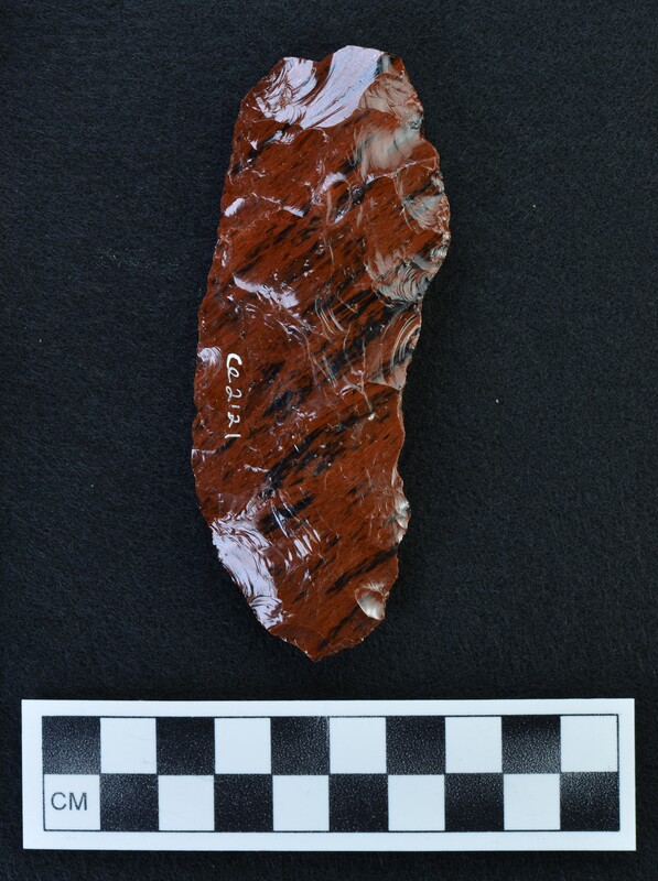 Biface made from mahogany obsidian with black diagonal striations