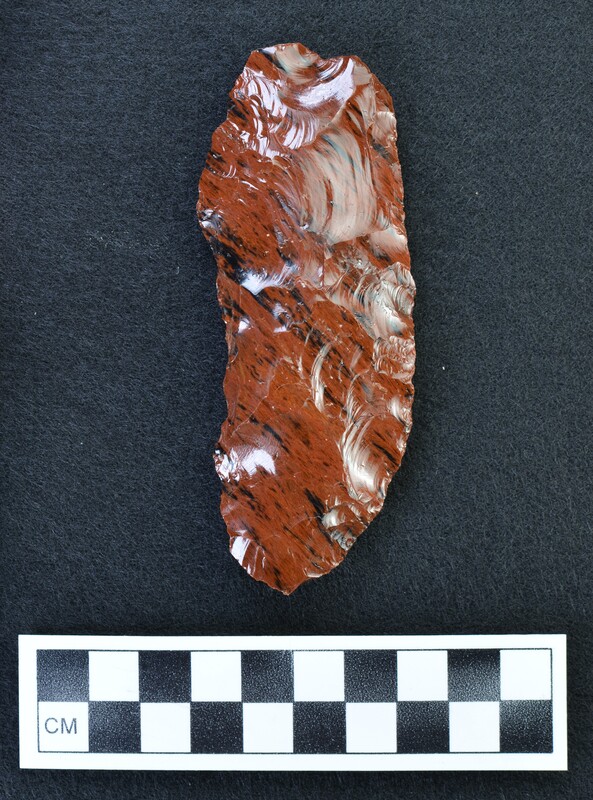 Biface made from mahogany obsidian with black diagonal striations