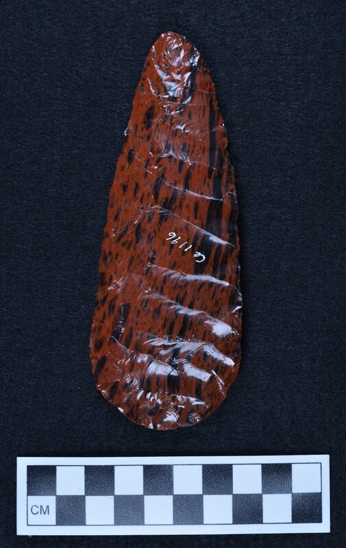 Pressure flaked one face, other side percussion