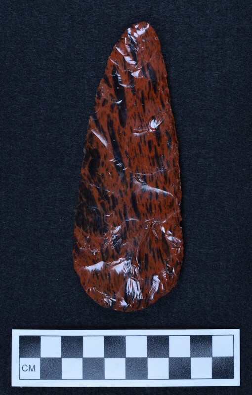 Pressure flaked one face, other side percussion