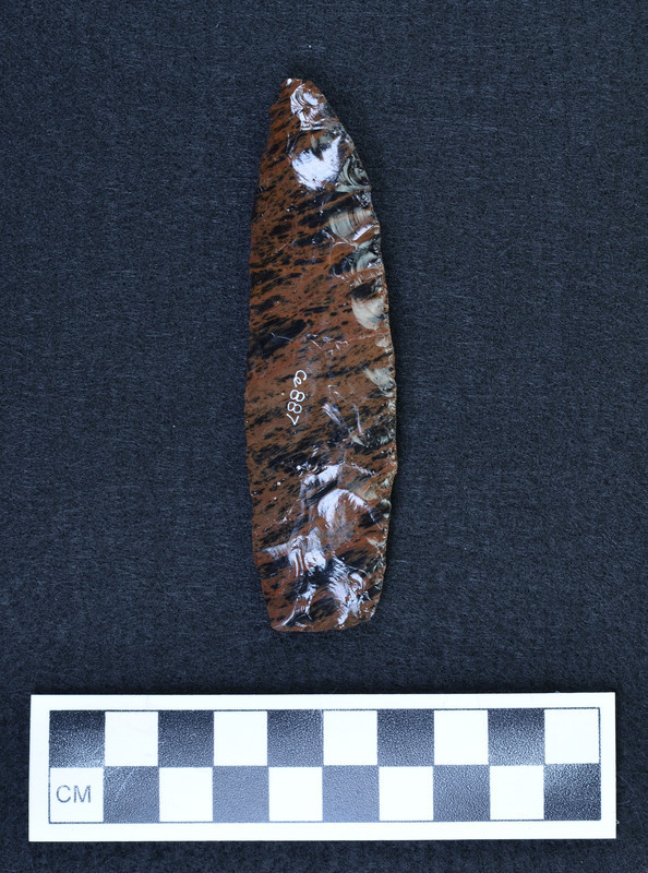 Percussion flaked, "Edges ground in preparation to do collateral pressure flaking. (GT)"