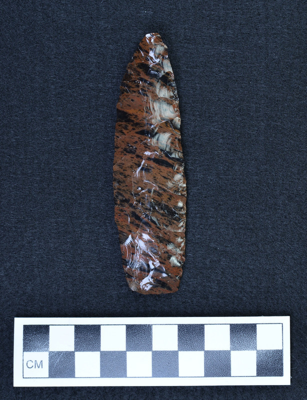 Percussion flaked, "Edges ground in preparation to do collateral pressure flaking. (GT)"