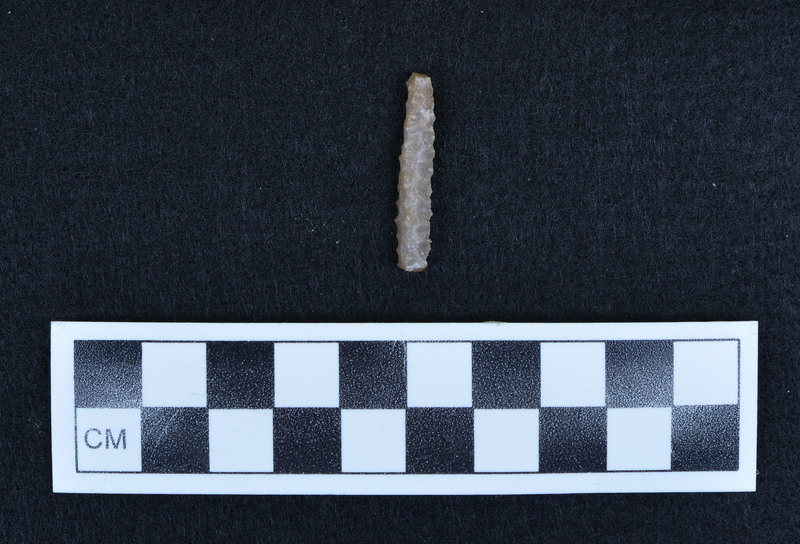 Flaked to form four surfaces, pressure flaked