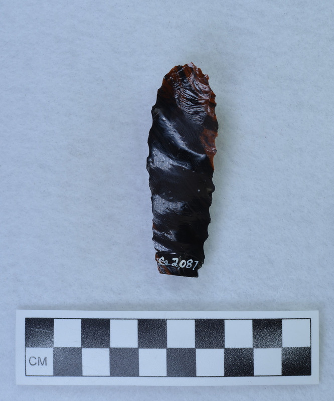 Pressure flaked on one face, made on flake