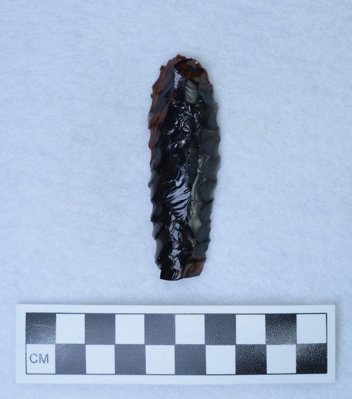 Pressure flaked on one face, made on flake