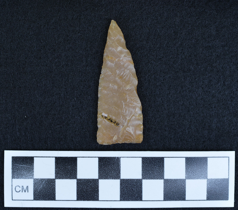 Flake removed from base on each face making point