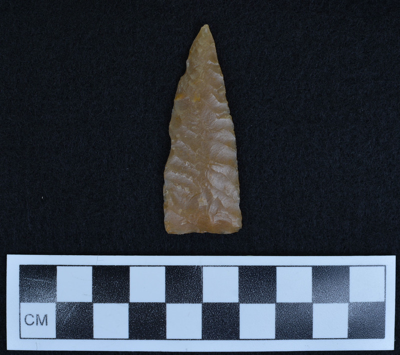 Flake removed from base on each face making point