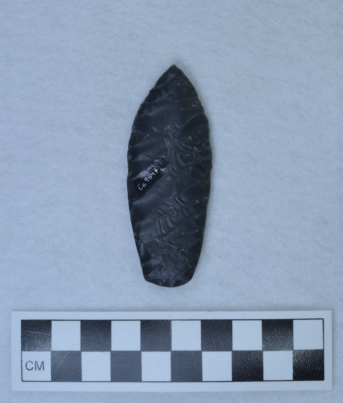 Titmus technique of holding, basal edges ground, Parallel oblique flaking. (GT)