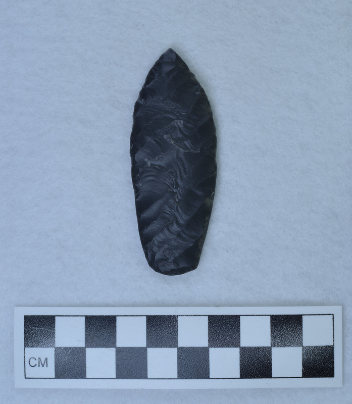 Titmus technique of holding, basal edges ground, Parallel oblique flaking. (GT)