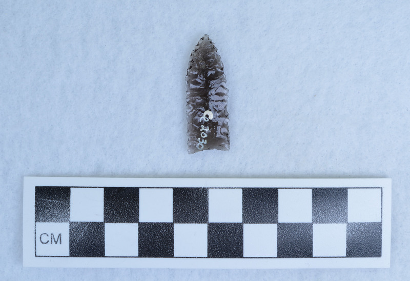 Basally thinned, collateral flaking