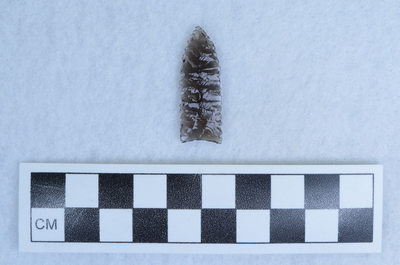 Basally thinned, collateral flaking