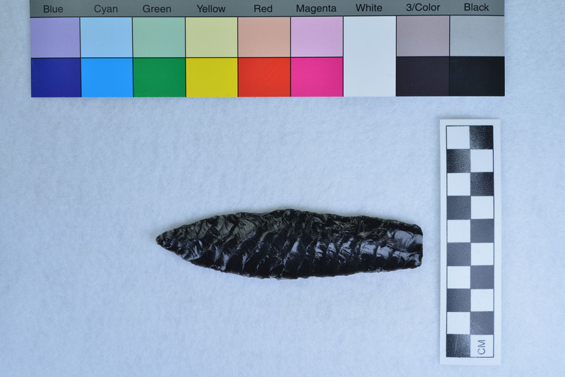 Parallel diagonal flaking, lanceolate stye, basal margins ground