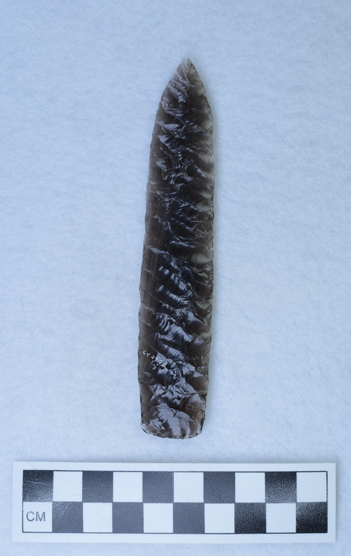 Parallel diagonal flaking, lanceolate style, ground basin margins, Signed by Crabtree.