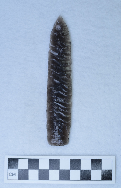 Parallel diagonal flaking, lanceolate style, ground basin margins, Signed by Crabtree.