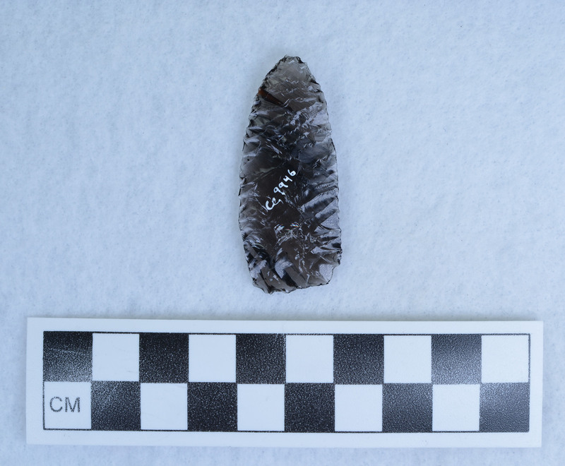 Titmus technique, What appears to be a channel flake actually originated at the distal end. This point was probably made on a blade with a portion of the original blade scar showing. (JW)