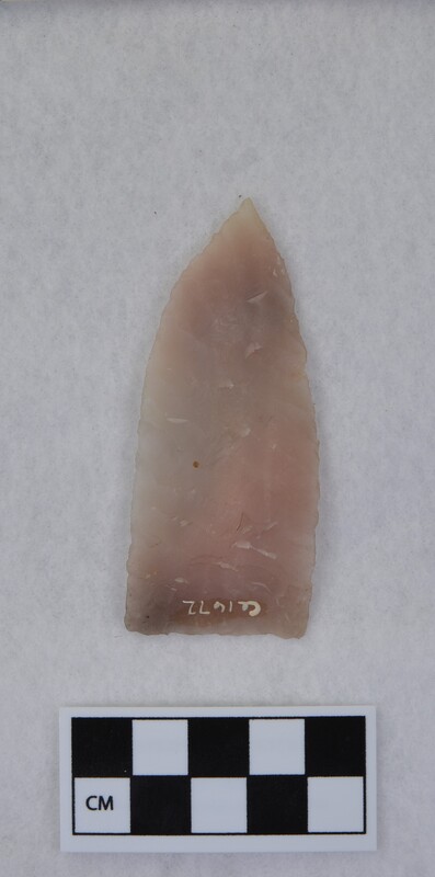 Broad lanceolate, basal thinning and grinding, heat treated, parallel diagonal flaking