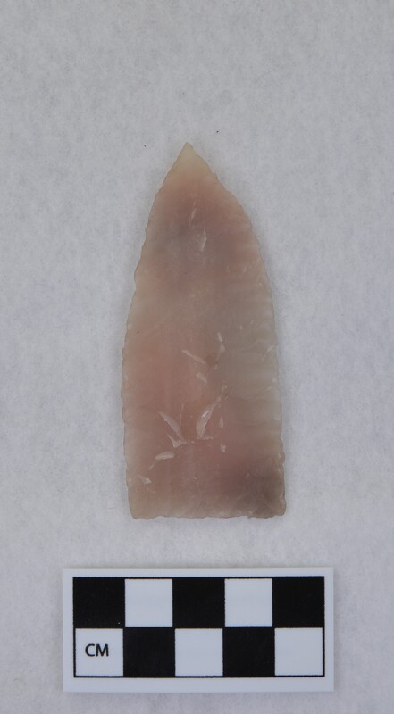 Broad lanceolate, basal thinning and grinding, heat treated, parallel diagonal flaking