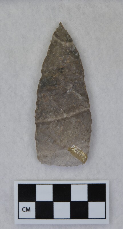 Broken, not heat treated, parallel diag. flaking, distal end