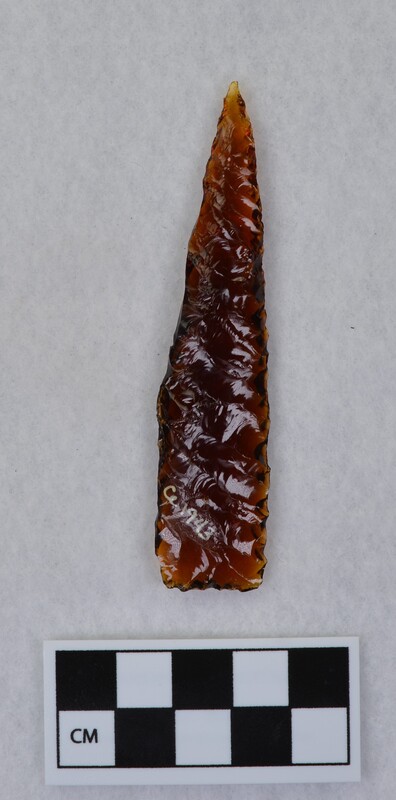 Brown glass (Clorox bottle base) exhibiting a perverse fracture on the margin that occurred during parallel diagonal flaking by Donald E. Crabtree