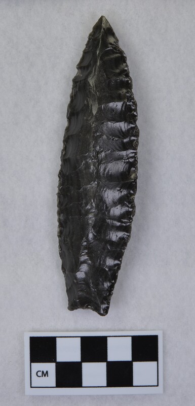 Collateral flaking to midsection lanceolate style, base thinned, concave base