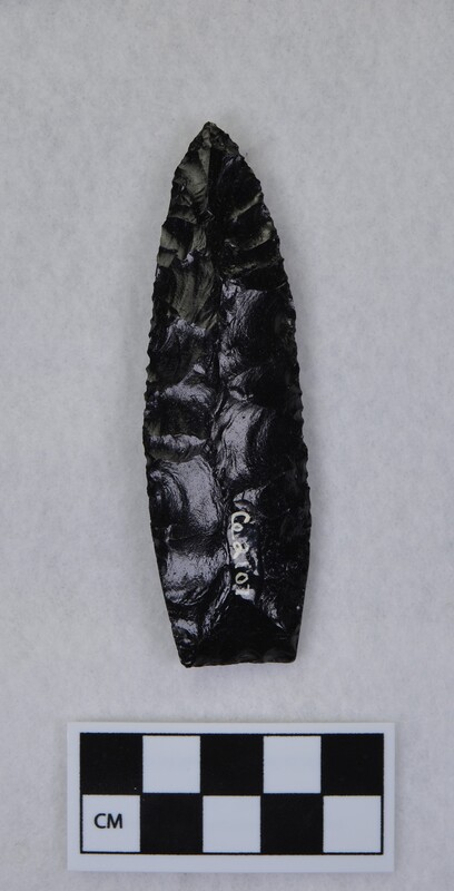 Collateral flaking to midsection, lanceolate style, basal margin lightly ground, base thinned