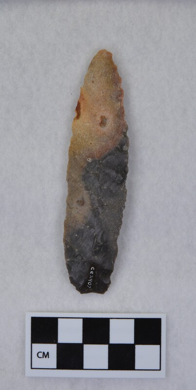 Diagonal flaking to midline to form dorsal ridge