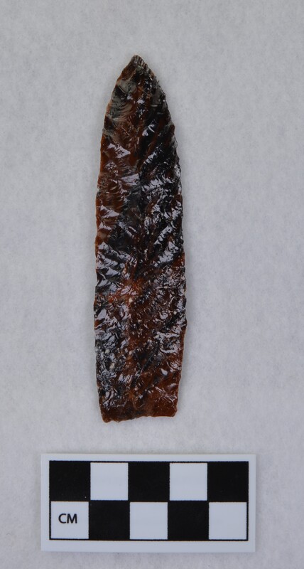 Parallel diagonal flaking one face, lanceolate style, edges slightly ground