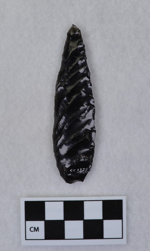 Titmus technique, flakes run full length of face. Flakes terminate just short of opposite margin. (JW)