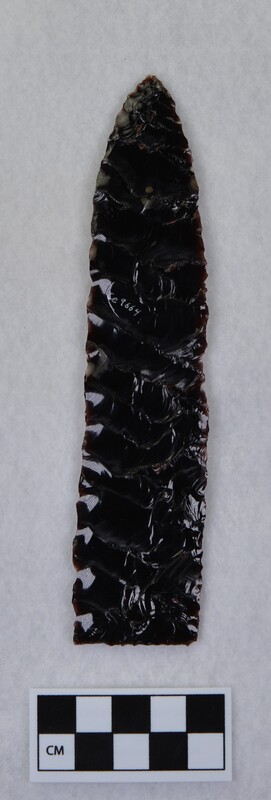 One side is Titmus style of flaking