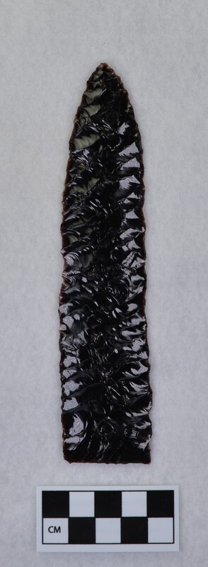 One side is Titmus style of flaking