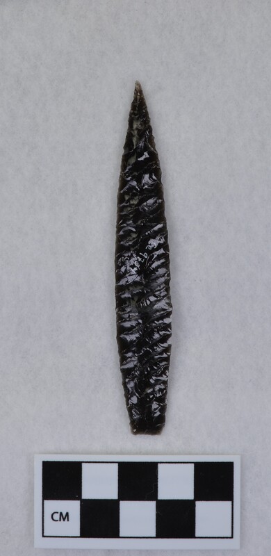 Titmus technique, parallel diagonal flaking, lanceolate style point, ground and thinned basal margins