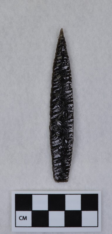 Titmus technique, parallel diagonal flaking, lanceolate style point, ground and thinned basal margins