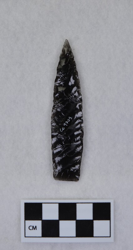 Titmus technique, parallel diagonal flaking, lanceolate style point, ground and thinned basal margins